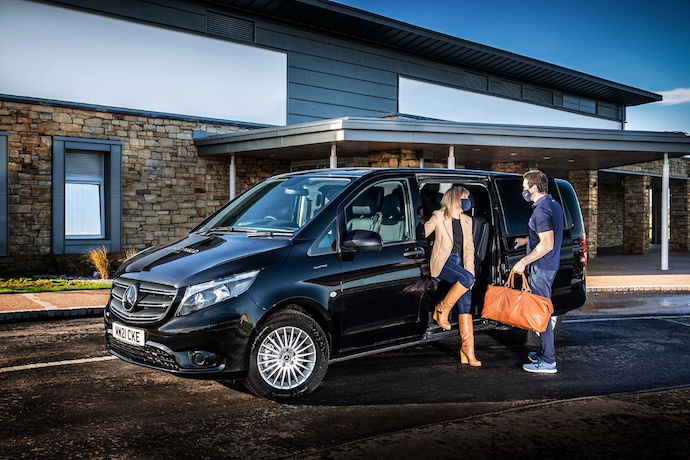 Club ferries golfers from the airport in battery-powered vehicle